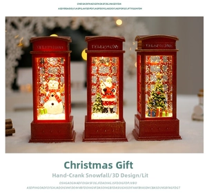 Detail view of retro red telephone booth Christmas lanterns with snowman and Santa scenes