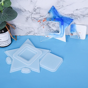 DIY star and square resin silicone molds with finished gold foil marble effect pieces