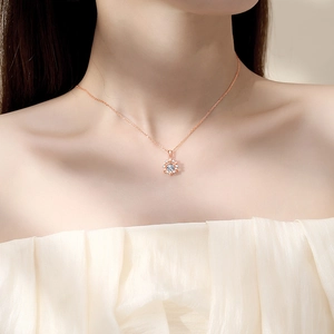 Elegant rose gold hexagram star necklace featuring a brilliant dancing moissanite stone