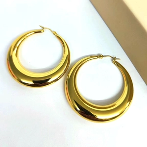 Polished 18K gold crescent moon hoop earrings in hollow thick stainless steel design