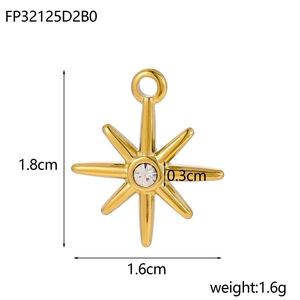 Detail of gold starburst pendant with 0.3cm zircon stone showing dimensions 1.8cm by 1.6cm