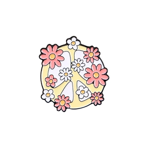 Floral yellow peace sign enamel pin with pink and white daisies on a white background