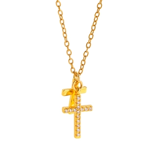 Elegant gold double cross necklace with shimmering cubic zirconia stones on white background