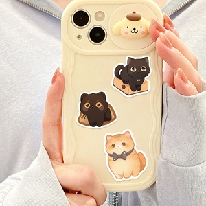Detail of cream wavy phone case with 3D cartoon dog ornament and cute cat stickers