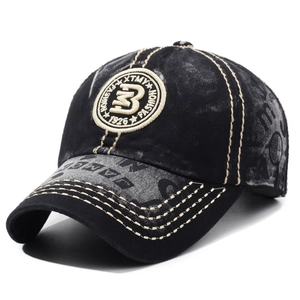 Vintage washed black cotton baseball cap with retro embroidery and contrast stitching