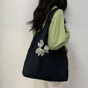 Large black canvas shoulder bag with 3D white mesh flower and pleated texture fabric