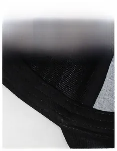 Macro detail of the wide moisture-wicking sweatband inside this black men's baseball cap