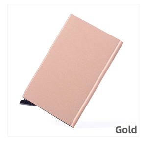 Sleek champagne gold RFID blocking aluminum card holder with a matte finish texture