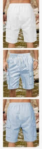 Detailed view of elastic drawstring waist and side cargo pockets on linen shorts