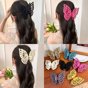 Matte double butterfly hair claw clips in assorted pastel colors for elegant updos