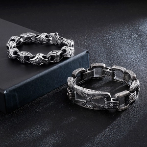 Vintage gothic titanium steel bracelet for men featuring retro cross and floral carvings