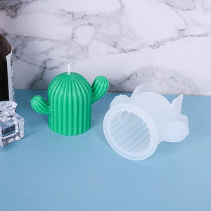 Detailed view of cactus candle with its translucent silicone mold for DIY soap making