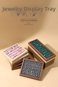 Bamboo ring display tray with 50 slots in multiple colors for jewelry organization