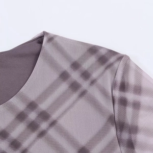 Close-up of purple and grey plaid tie-dye fabric with breathable mesh texture