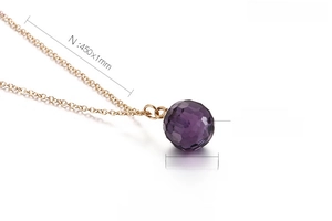 Detail showing 12mm purple crystal pendant and 450mm gold-plated stainless steel chain