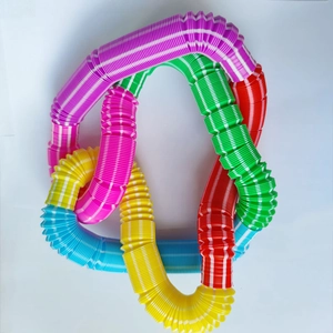 Colorful 29mm pop tubes stretching toy in vibrant rainbow stripes for sensory stress relief