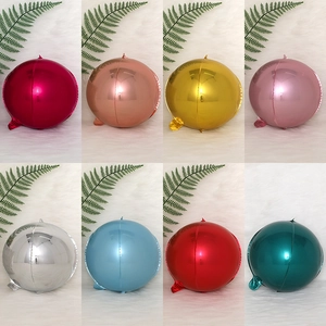 Metallic 4D round aluminum foil balloons in various colors on white fur background