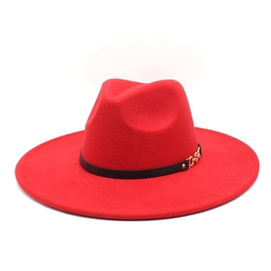 Detailed shot of the red wool felt fedora with a black leather band and gold metal chain buckle