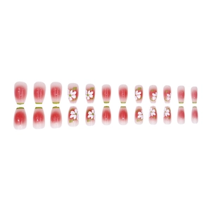 French blush press-on nails with pink gradient and white camellia flower patterns