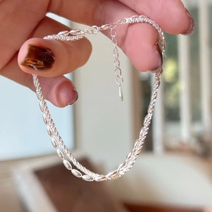 Elegant S925 sterling silver double-layer bracelet with satellite beads and sleek snake chain