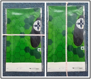 Detail view of video game party tablecloth measurements showing width and length in package