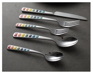 5-piece stainless steel cutlery set with colorful enamel handles on dark background