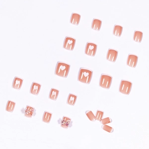 French tip nude pink press-on nails with 3D iridescent butterfly bows and heart prints