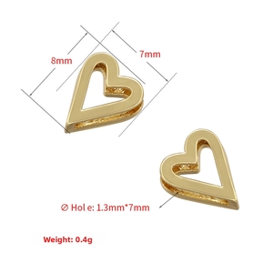 Detailed macro view of 18k gold plated hollow heart-shaped charms with dimensions and weight