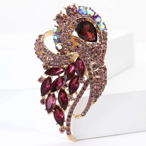 Detailed view of high-end alloy brooch with colorful rhinestones on white display