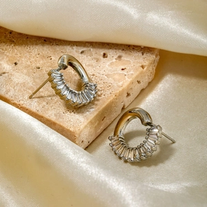 Elegant silver circle stud earrings with baguette-cut zircon in minimalist style