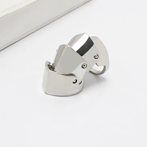 Close-up of flexible three-section armor ring with silver polished metal finish