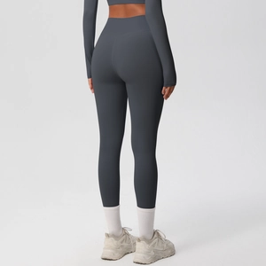Detail of high-waisted yoga leggings featuring back V-shape stitching and lifting effect
