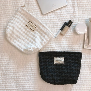 Set of black and white checkered bubble makeup bags with TIME TO PARTY decorative label