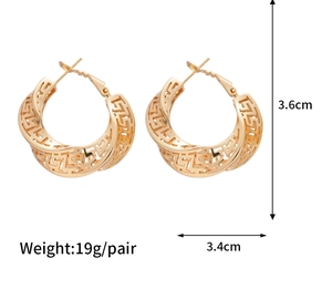 Detail view of gold hollow earrings showing Greek key pattern and dimensions of 3.6cm