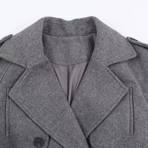 Grey wool blend double-breasted coat with detailed lapels, epaulettes, and button accents