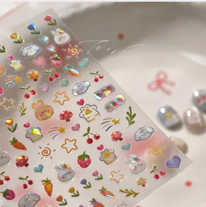 Macro view of rabbit and star nail art stickers with iridescent laser finish effect