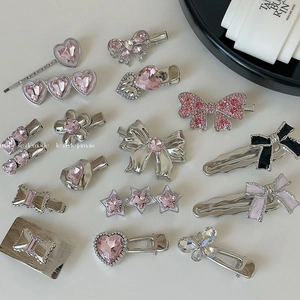 Detailed set of pink rhinestone hair clips with heart and flower alloy designs