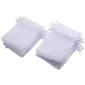 White organza drawstring gift bags made of premium sheer mesh fabric for jewelry packaging