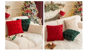 Close-up of textured Christmas pillows with 3D reindeer and snowflake embroidery