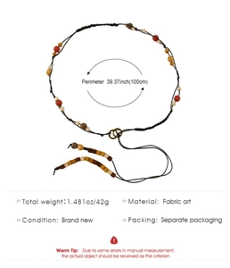 Detail of bohemian braided waist rope with colorful wooden beads and metal ring connector