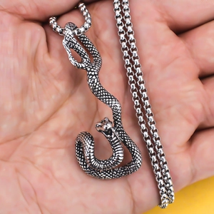 Punk style snake pendant necklace in vintage silver finish with detailed scale texture