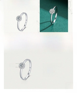 Macro detail of S925 silver halo ring with diamond center and petal-shaped setting