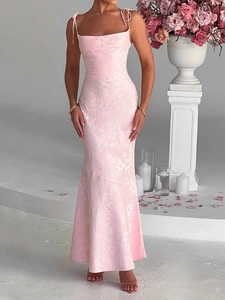 Elegant pink floral maxi dress featuring a slim fit and spaghetti straps for formal occasions