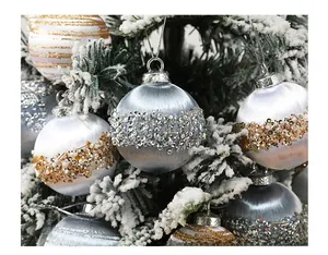 Detailed view of handmade sequins and beads on silk Christmas ball ornaments