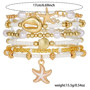 Detail shot of bohemian bracelets showing size 17cm and 15.5g weight with starfish charms