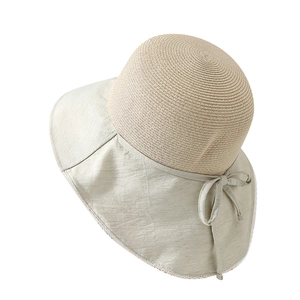 Women's straw sun hat with breathable brim and bow detail against white background