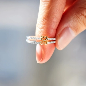 Elegant S925 silver infinity and gold heart rings set with sparkling zircon stones