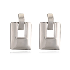 Minimalist silver geometric square earrings with a polished metallic finish and modern style