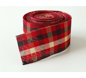 Close-up of red and black buffalo plaid ribbon with woven gold thread for Christmas