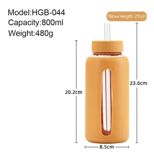 800ml glass water bottle with orange silicone sleeve, time markers and straw measurements